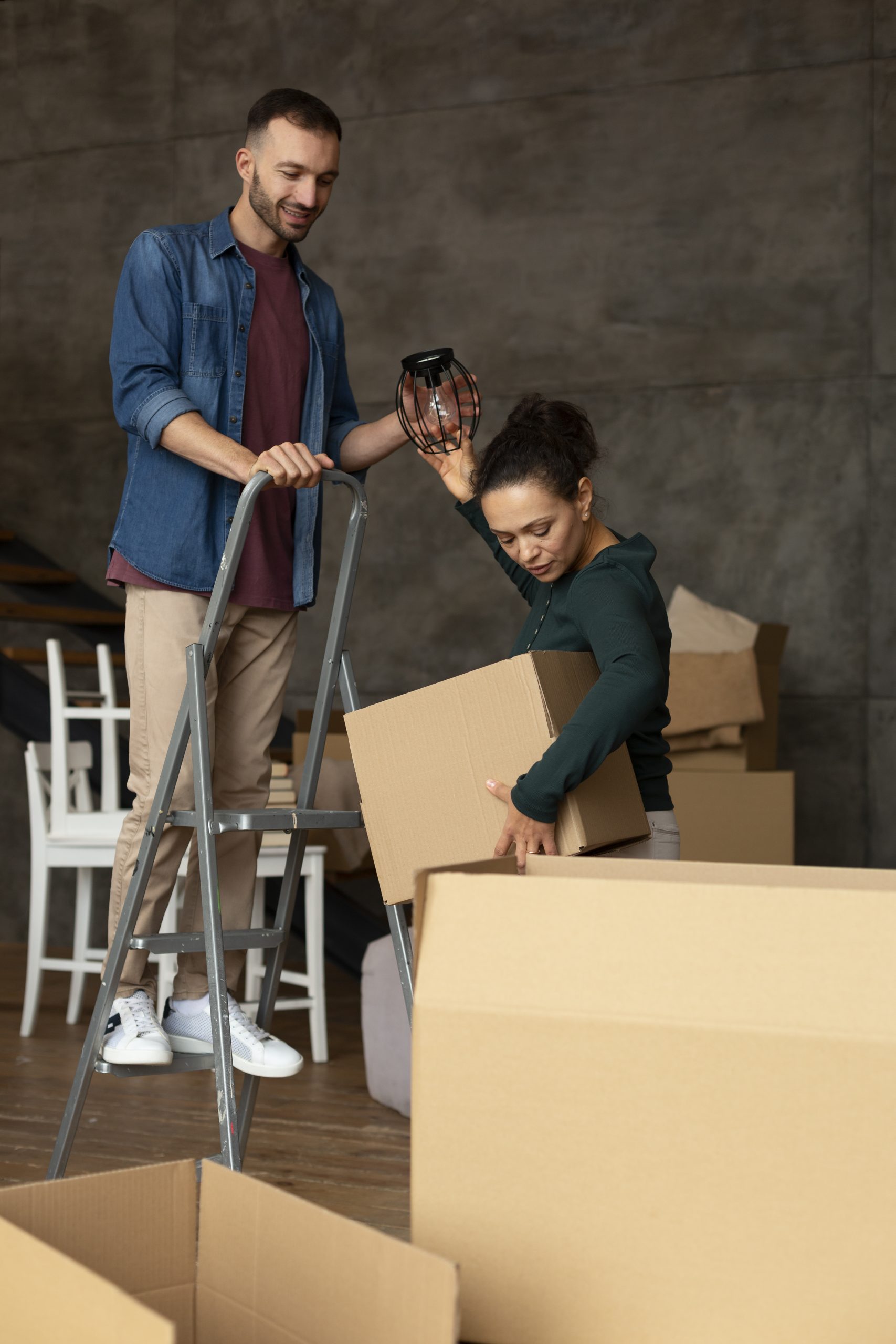 couple moving boxes